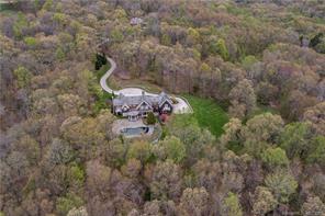 Privacy abounds on the 42 acre estate with only 2 other homes in this development.  Located near fabulous restaurants, movie theater, shopping and the best natural markets while being closer to NY.  Think Logical, buy intelligently.